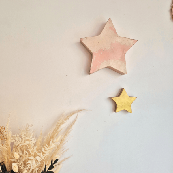 Grande étoile en métal rose