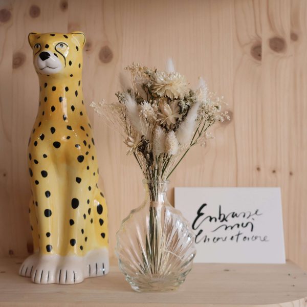 Petit soliflore coquillage avec fleurs