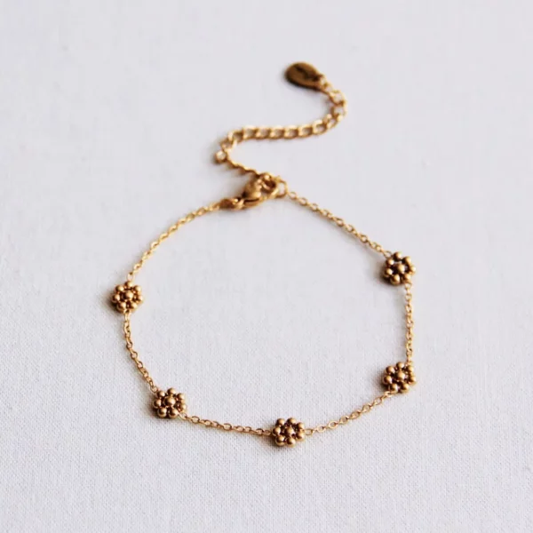 Bracelet en acier inoxydable avec fleur de marguerite fine - doré